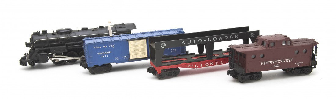 A Lionel Train Set, Length of first 11 1/4 inches: A Lionel Train Set, comprising an engine (736), two Sante Fe engines, a Vista Dome car (2522), two Pullman cars (2523), an observation car (2521), a gondola car (6162-110), an autoloader (6414), a Pen