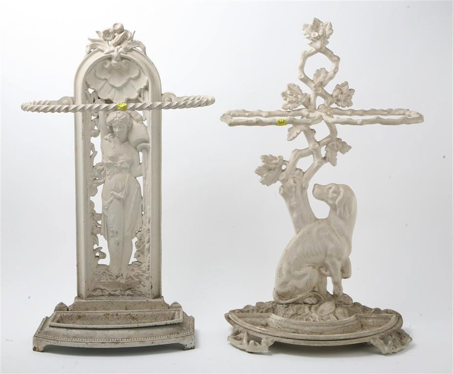 A Pair of Victorian Cast Iron Umbrella Stands, He: A Pair of Victorian Cast Iron Umbrella Stands, one in the form of a classical maiden, the other a dog. Height 28 1/2 inches.