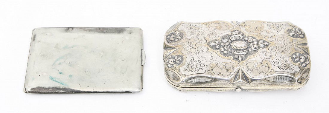 A Continental Silver Box, Width of first 5 1/4 in: A Continental Silver Box, of rectangular form together with an American silverplate cigarette box; approximate weight of first 2.87 ozt. Width of first 5 1/4 inches. Property from the Estate of Jean R