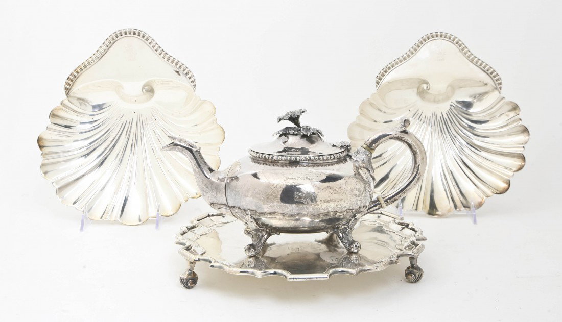A Collection of Silverplate Serving Articles, Dia: A Collection of Silverplate Serving Articles, comprising a salver, a teapot and two shell form dishes. Diameter of first 10 1/2 inches. Property from the Estate of Jean Ross, Lake Forest, Illinois