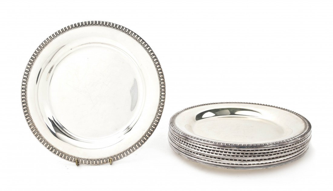 A Set of Twelve American Silverplate Chargers, Wi: A Set of Twelve American Silverplate Chargers, Wilcox, each of circular form with gadrooned rims. Diameter 12 inches. Property from the Leon Brown Trust, U.S. Bank, Trustee, Troy, Ohio