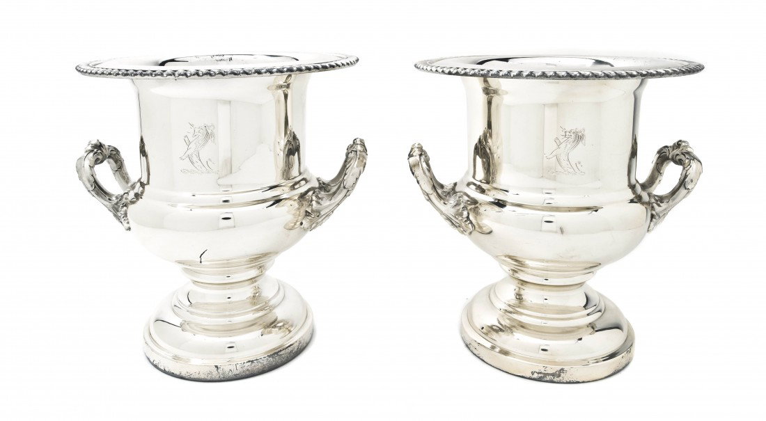 A Pair of English Silverplate Wine Buckets, Heigh: A Pair of English Silverplate Wine Buckets, each of handled baluster form with engraved lion crest. Height 10 inches. Property from the Leon Brown Trust, U.S. Bank, Trustee, Troy, Ohio