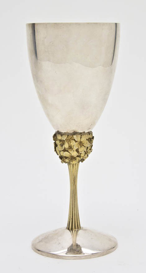An English Silver Goblet, Stuart Devlin, Height 6: An English Silver Goblet, Stuart Devlin, London, 1977, the tapering bowl having a gilt interior over the stylized gilt bouquet stem, raised on a circular foot; approximate total weight 7.67 ozt. Heigh