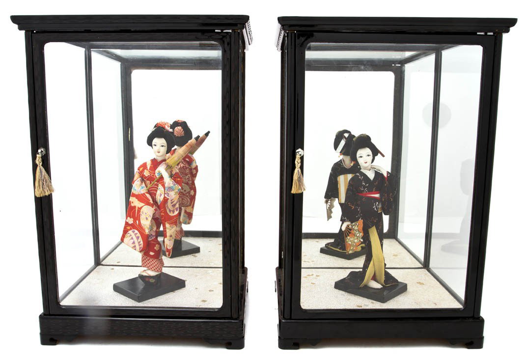 A Pair of Japanese Cloth Dolls, Height overall 17: A Pair of Japanese Cloth Dolls, each depicting a geisha set in a black lacquered case. Height overall 17 inches. Property from the Leon Brown Trust, U.S. Bank, Trustee, Troy, Ohio
