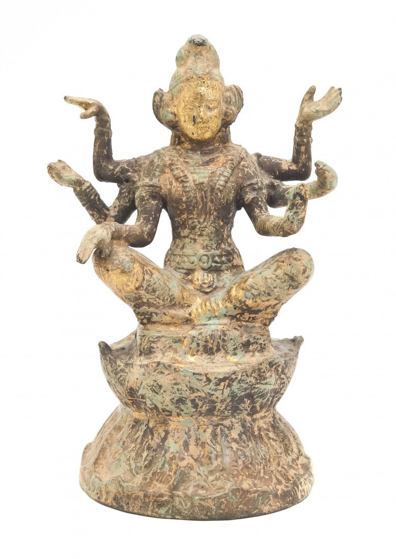 A Southeast Asian Figure of a Multi-Armed Deity, : A Southeast Asian Figure of a Multi-Armed Deity, retaining partial gilt finish. Height 9 1/2 inches. Property from the Leon Brown Trust, U.S. Bank, Trustee, Troy, Ohio