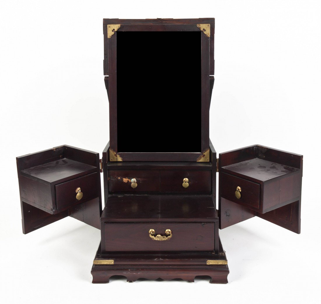 A Chinese Dressing Box, Height 12 x depth 18 x wi: A Chinese Dressing Box, the hinged top opening to a mirrored interior, the base further opening to a series of drawers. Height 12 x depth 18 x width 13 3/4 inches. Property from the Leon Brown Trust, 