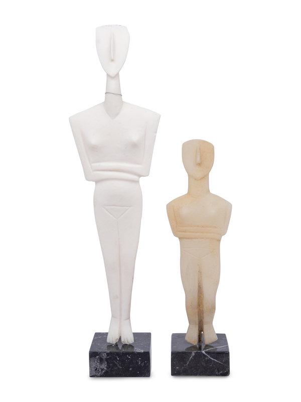 Two Carved White Marble Replica Cycladic Figures: Two Carved White Marble Replica Cycladic Figures Height of taller overall 16 inches; height of shorter overall 10 5/8 inches. This lot is located in Chicago. Property from Linden House, In