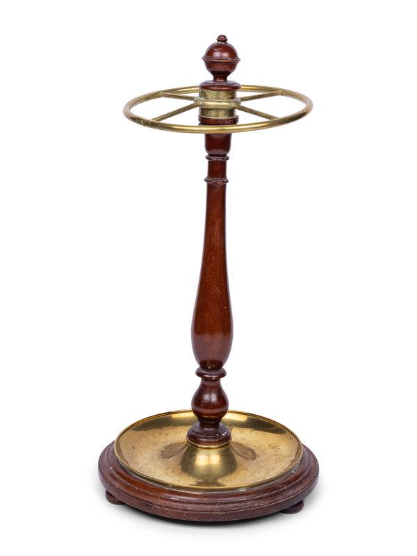 A Victorian Brass and Walnut Umbrella Stand: A Victorian Brass and Walnut Umbrella Stand Late 19th/Early 20th Century Height 23 1/2 x diameter of base 11 1/2 inches. This lot is located in Chicago. Property from a Private Collection,