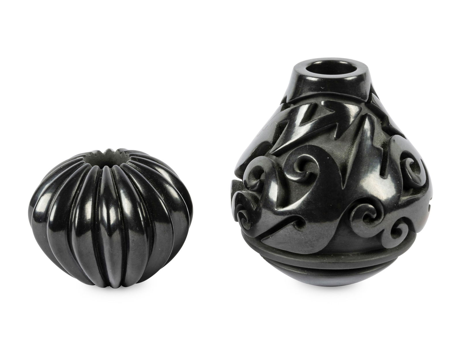 Nancy Youngblood (Santa Clara, b.1955) Two Jars: Carved Blackware Jar with Avanyu Design, 1988 and (1 of 5)
