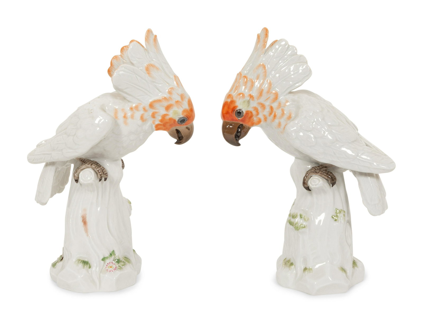 A Pair of Meissen Porcelain Cockatoos: A Pair of Meissen Porcelain Cockatoos 19th/20th Century marked with cross swords in underglaze blue to underside. Height 10 1/8 inches. Property from the Estate of Hermé de Wyman Miro, Palm Beach