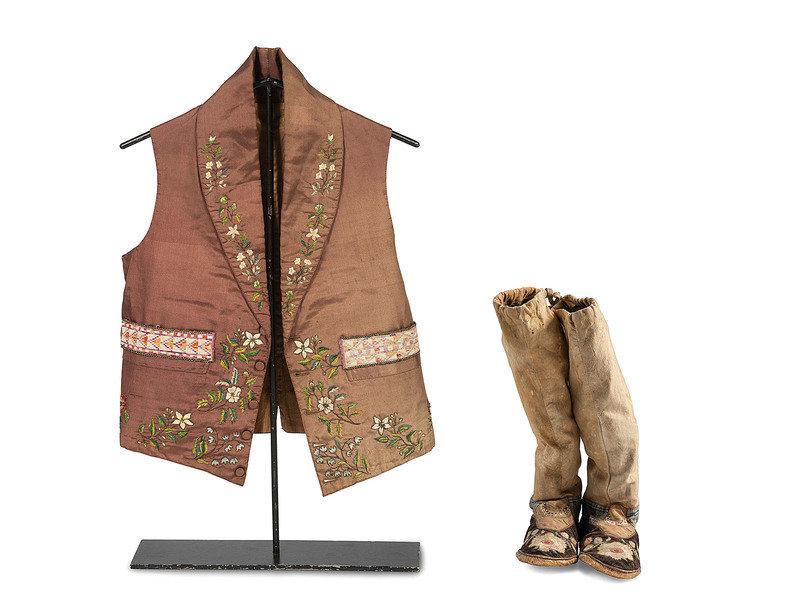 Cree Moosehair Embroidered Boot Moccasins and Vest: Cree Moosehair Embroidered Boot Moccasins and Vest first quarter 20th century lot of 2, includes: a pair of moccasins, thread-sewn on hide edged with velvet; vamps with embroidered floral mot