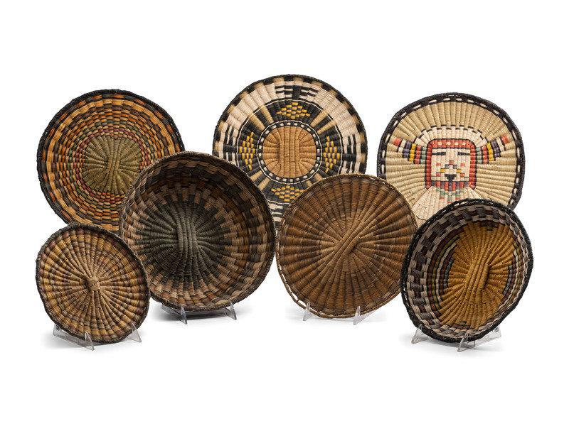 Collection of Hopi Third Mesa Wicker Baskets: Collection of Hopi Third Mesa Wicker Baskets second half 20th century lot of 7, diameters range from 8-1/2 to 13-1/2 inches This lot is located in Cincinnati.