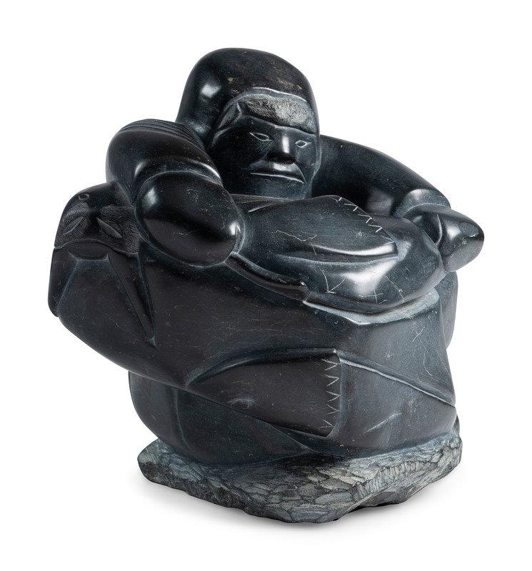 Jobie Inukpuk (Inuit, Inukjuak, 1934-1983) Soapstone Sculpture of Hunter and Walrus: Jobie Inukpuk (Inuit, Inukjuak, 1934-1983) Soapstone Sculpture of Hunter and Walrus included is a copy of the Canadian Government's artist card height 11-3/4 inches x width 12-1/2 inches