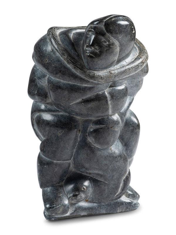 Inuit Soapstone Carving of Hunter and Seal : Inuit Soapstone Carving of Hunter and Seal second half 20th century not signed height 13-3/8 inches This lot is located in Cincinnati.