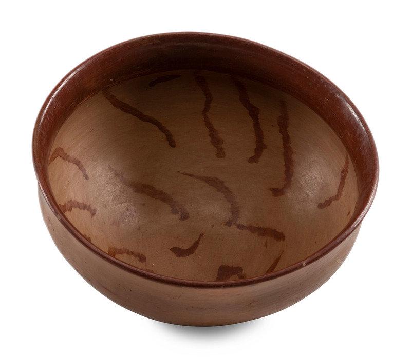 Ohkay Owingeh Redware Pottery Bowl: Ohkay Owingeh Redware Pottery Bowl first quarter 20th century height 5 inches x diameter 11 inches This lot is located in Cincinnati.