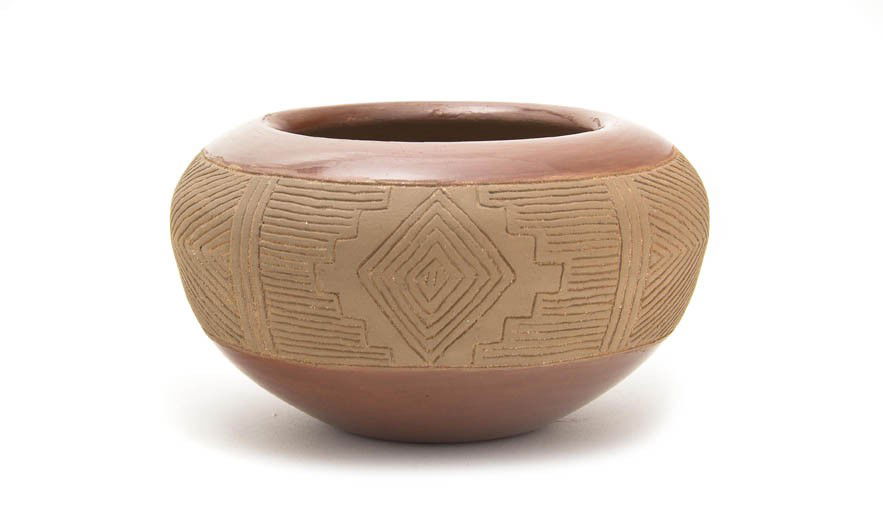 A San Juan Redware Bowl, Height 4 x diameter 6 1/2: A San Juan Redware Bowl, having sgraffito design, signed Martin Aquino, San Juan Pue. Height 4 x diameter 6 1/2 inches.