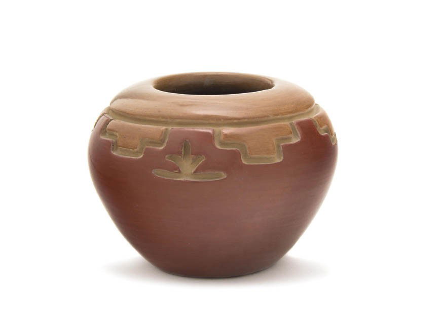 A San Juan Two Colored Redware Jar, Height 4 x dia: A San Juan Two Colored Redware Jar, having incised decoration, signed Mary E. Archuletta, San Juan. Height 4 x diameter 5 inches.