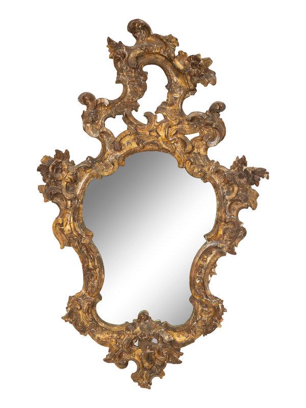 An Italian Giltwood Mirror: An Italian Giltwood Mirror Early 19th Century Height 34 x width 22 inches.