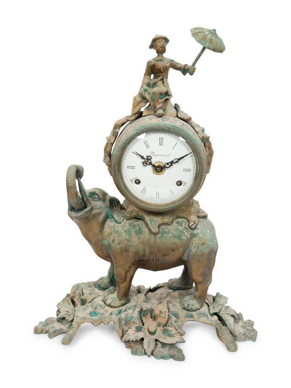 An Italian Imperial Bronze Elephant Clock with Rider: An Italian Imperial Bronze Elephant Clock with Rider the 2 bell striking movement is German by Franz Hermle and Sohne. Height 16 inches. Condition Bronze has severe ox