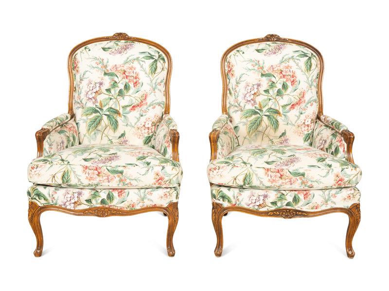 A Pair of Louis XV Style Walnut Bergères: A Pair of Louis XV Style Walnut Bergères 19th/20th Century Height 41 x width 30 x depth 26 inches. Property from the Estate of Diane Lambert, Palm Beach, Florida