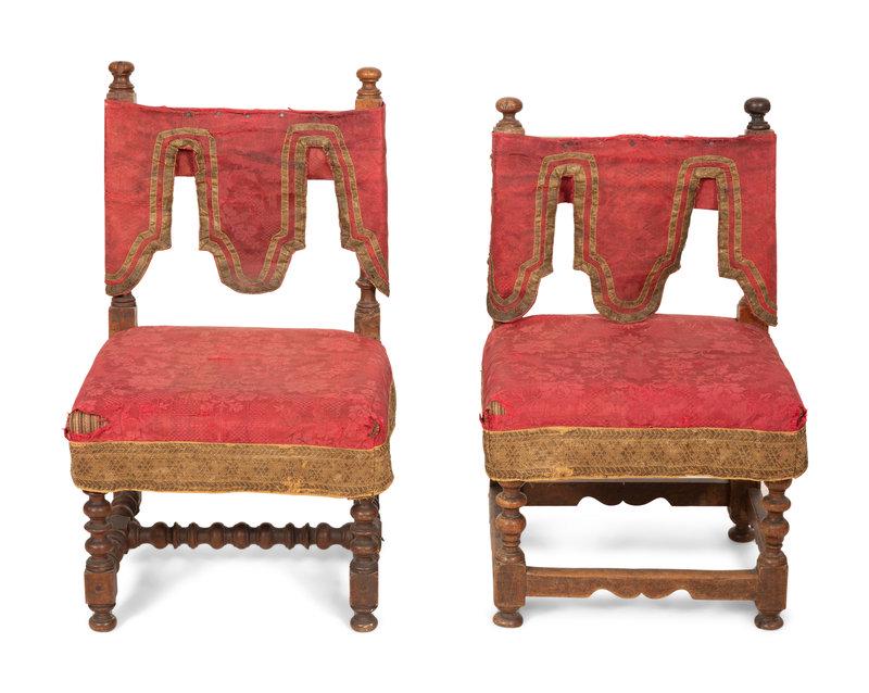 A Pair of Jacobean Style Walnut Low Chairs: A Pair of Jacobean Style Walnut Low Chairs Late 18th/Early 19th Century with red damask seat and back coverings. Height 26 x width 16 1/2 x depth 14 1/4 inches.