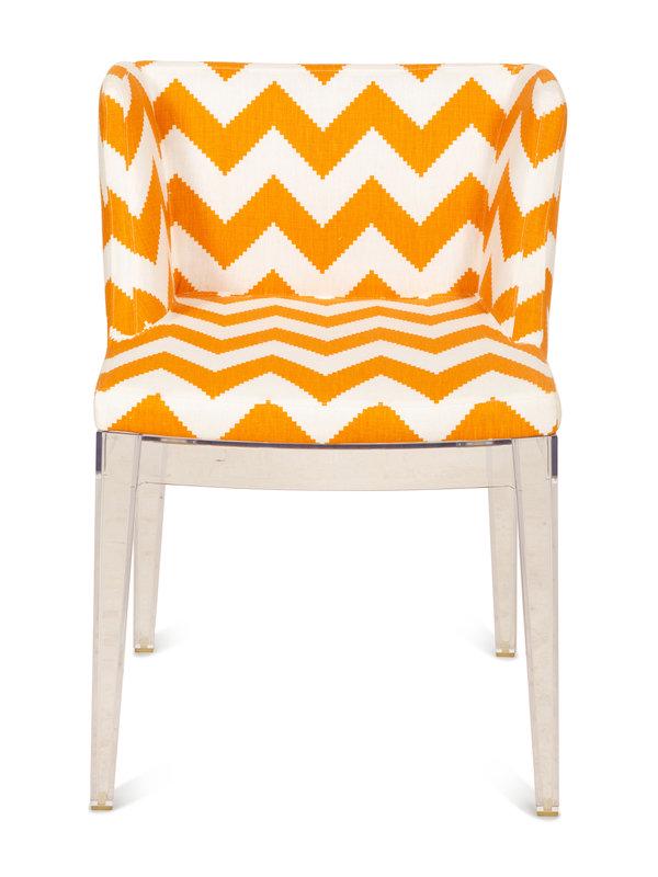 A Philippe Starck for Kartell Mademoiselle Chair: A Philippe Starck for Kartell Mademoiselle Chair with lucite legs; the seat and back with orange and white chevron upholstery.Height 30 x width 19 1/4 x depth 18 1/21 inches. <