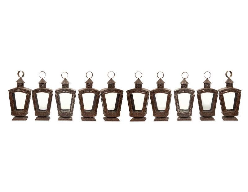 A Group of Ten Patinated Metal Lanterns: A Group of Ten Patinated Metal Lanterns 20th Century Height 26 inches x width 11 inches. Property of a Palm Beach Collector