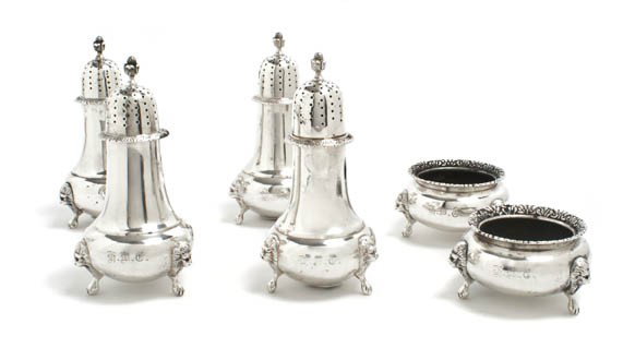 A Set of American Sterling Silver Articles, Black,: A Set of American Sterling Silver Articles, Black, Starr & Frost, comprising four casters of baluster form and two salt cellars of squat form, each raised on lion mask and paw feet; approximate total 