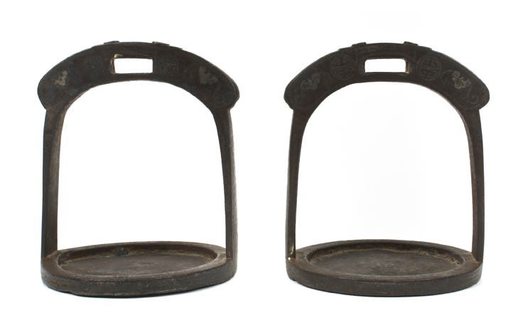 A Pair of Chinese Iron Stirrups, Height 6 1/4 inch: A Pair of Chinese Iron Stirrups, of typical form, having circular foot rests and inlaid silver wire decoration throughout. Height 6 1/4 inches.