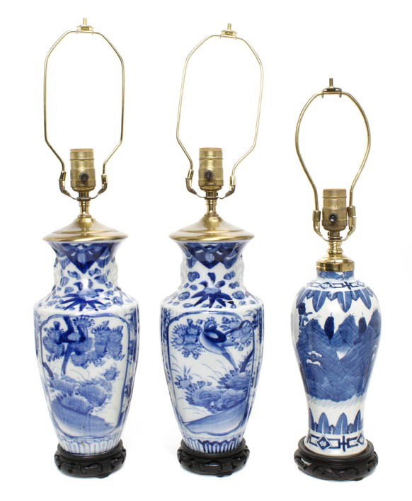 Three Chinese Porcelain Vases, Height 24 3/4 inche: Three Chinese Porcelain Vases, each of baluster form, having landscape decoration raised on hardwood bases, mounted as lamps. Height 24 3/4 inches.
