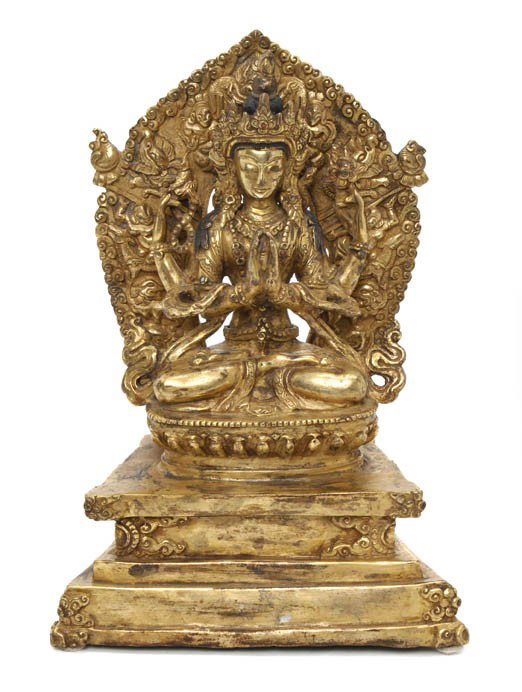 A Gilt Bronze Model of a Deity, Height 8 1/4 inche: A Gilt Bronze Model of a Deity, the multi-armed figure raised on a lotus platform base. Height 8 1/4 inches. Property from a Private Collector Boca Raton, Florida