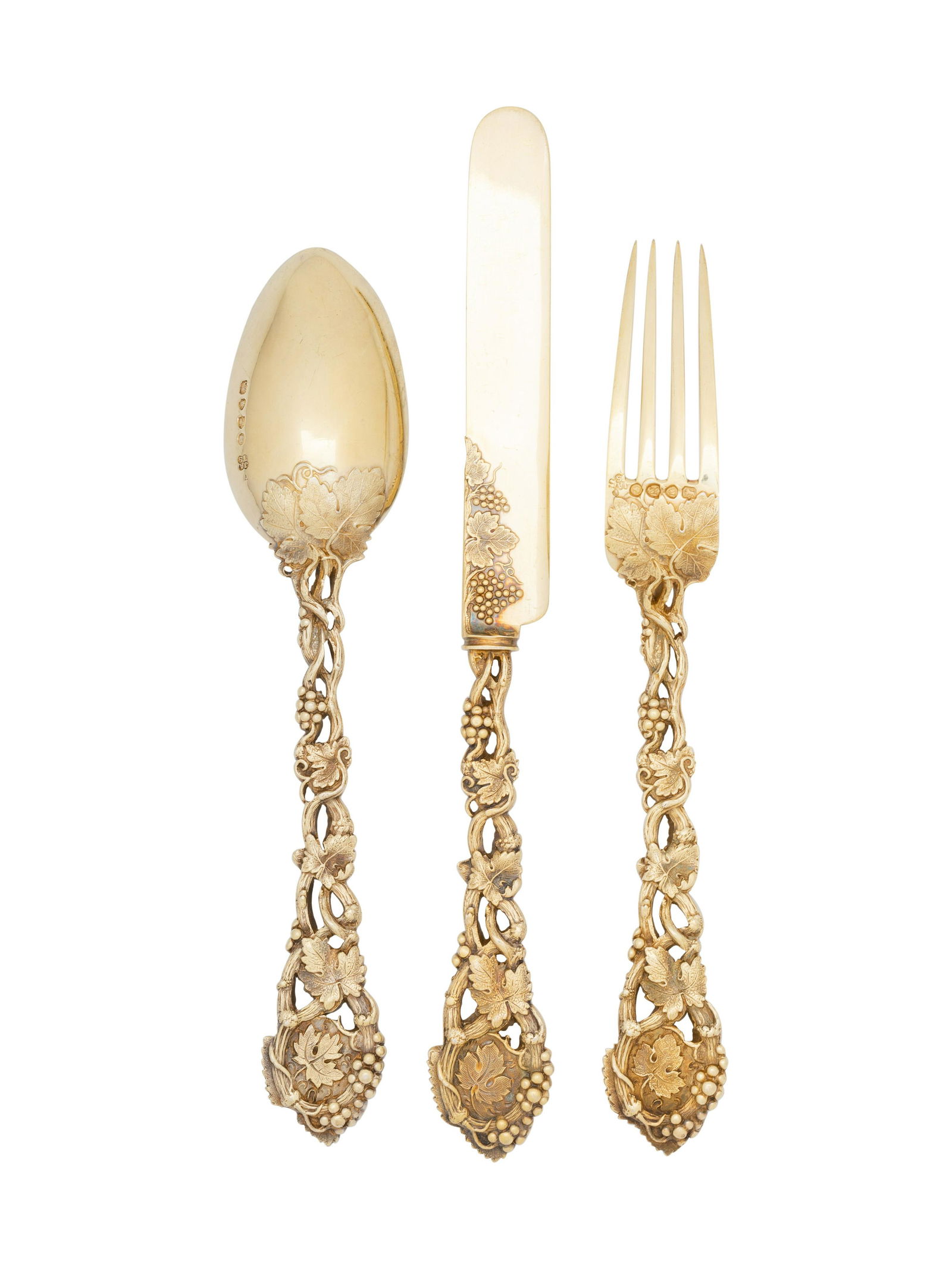 An English Silver-Gilt Dessert Service: An English Silver-Gilt Dessert Service London, Late 19th/Early 20th Century with a fitted wood case, comprising: 12 dessert knives marked for John Marshall Spink, London, 1906 12 dessert forks marked
