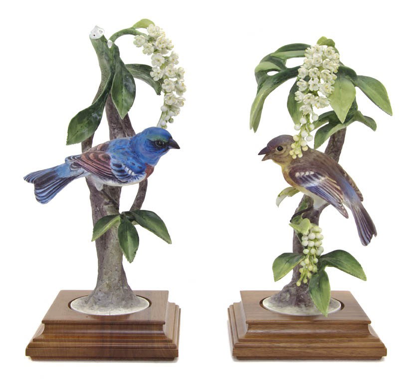A Pair of Royal Worcester Dorothy Doughty Birds, : A Pair of Royal Worcester Dorothy Doughty Birds, Lazuli Buntings, each perched on a wild chokecherry branch. Height of taller 10 3/4 inches.