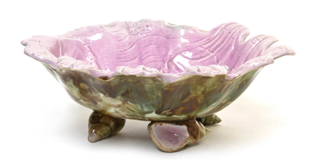 A Majolica Shell Form Center Bowl, Width 11 5/8 i: A Majolica Shell Form Center Bowl, raised on three shell feet. Width 11 5/8 inches.