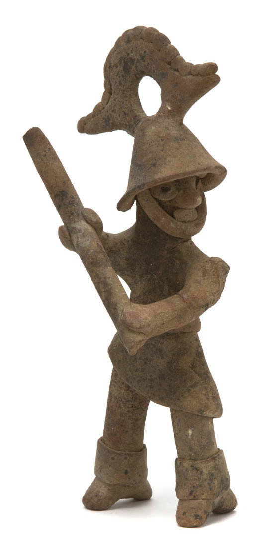 A Nayarit Ceramic Figure of a Warrior, Height 7 i: A Nayarit Ceramic Figure of a Warrior, wearing a hat and holding a weapon. Height 7 inches.