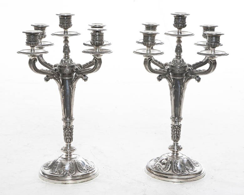 A Pair of French Silverplate Five-Light Candelabr: A Pair of French Silverplate Five-Light Candelabra, Ercuis, each having a foliate cast standard and candle arms, set on a circular base. Height 17 1/4 inches. Property from the Collection of Dianne Dr