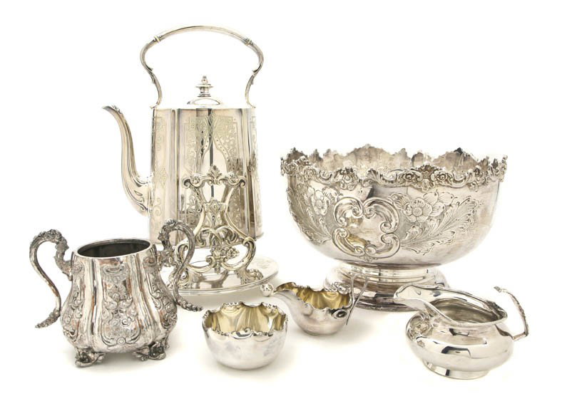A Collection of English Silverplate Serving Artic: A Collection of English Silverplate Serving Articles, comprising a hot water kettle on stand, a punch bowl, two sugars and two creamers. Height of tallest 15 1/2 inches.