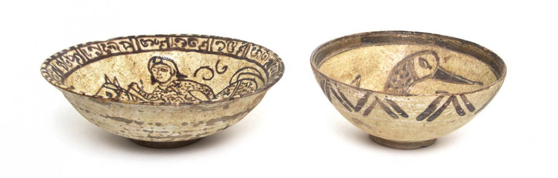 A Group of Two Kashan Bowls, Diameter of first 9 : A Group of Two Kashan Bowls, Nishapur with Kufic script, the first depicting a figure riding a horse on the interior, the second having a bird. Diameter of first 9 3/4 inches.
