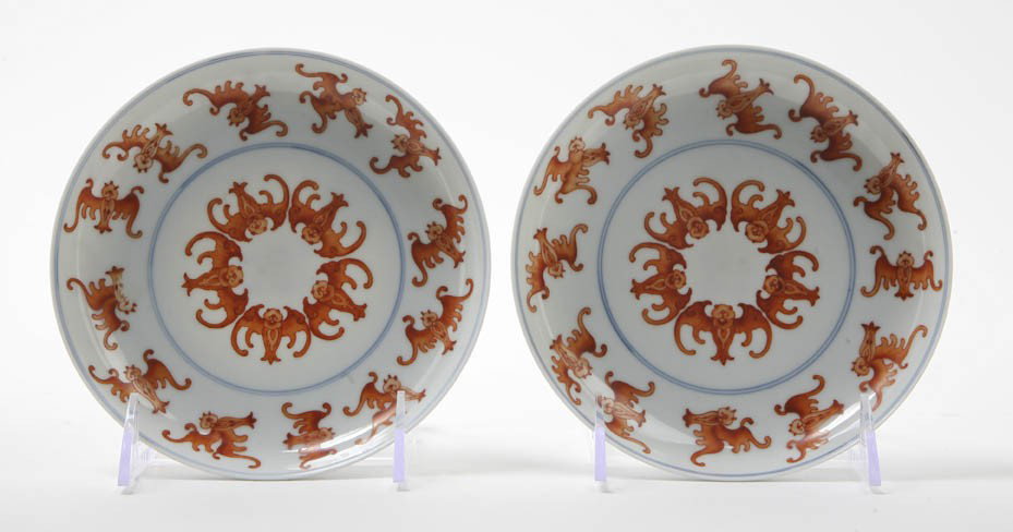 A Pair of Chinese Porcelain Dishes, Diameter 6 1/: A Pair of Chinese Porcelain Dishes, the interior with overglaze red decoration of bats, having double blue ring around the center, the undersides with bats around the center and with Yongzheng reign m