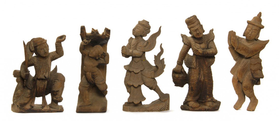 A Group of Five Southeast Asian Carved Wood Figur: A Group of Five Southeast Asian Carved Wood Figures, each having light remnants of polychrome decoration with the figures in various garments and poses. Height of tallest 17 1/2 inches. Property from 