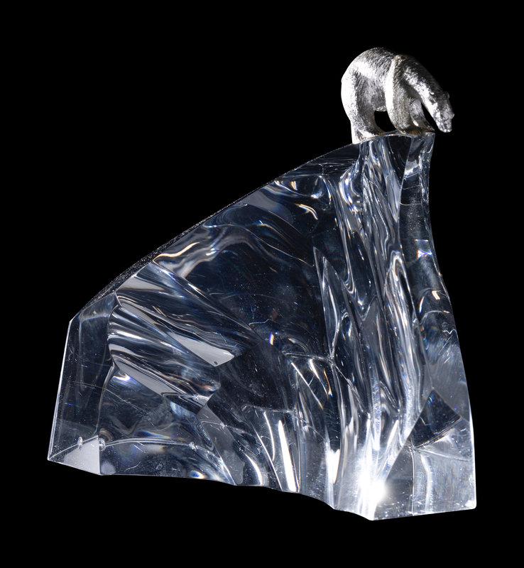 A Steuben Glass and Silver Ice Bear Sculpture: A Steuben Glass and Silver Ice Bear Sculpture Designed by James Houston, 1974 Height 5 1/2 inches. This lot is located in Chicago.