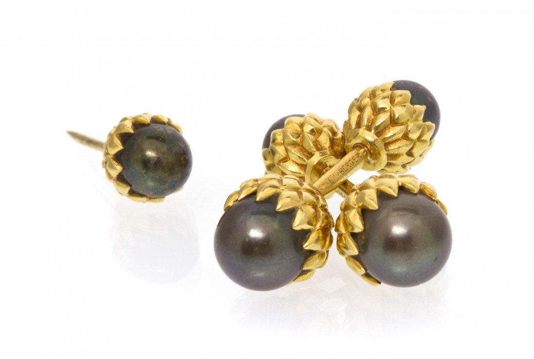 An 18 Karat Yellow Gold and Tahitian Pearl Partial: An 18 Karat Yellow Gold and Tahitian Pearl Partial Dress Set, Jean Schlumberger for Tiffany & Co., consisting of a pair of cufflinks containing four pearls measuring approximately 7.50-9.10 mm in diam