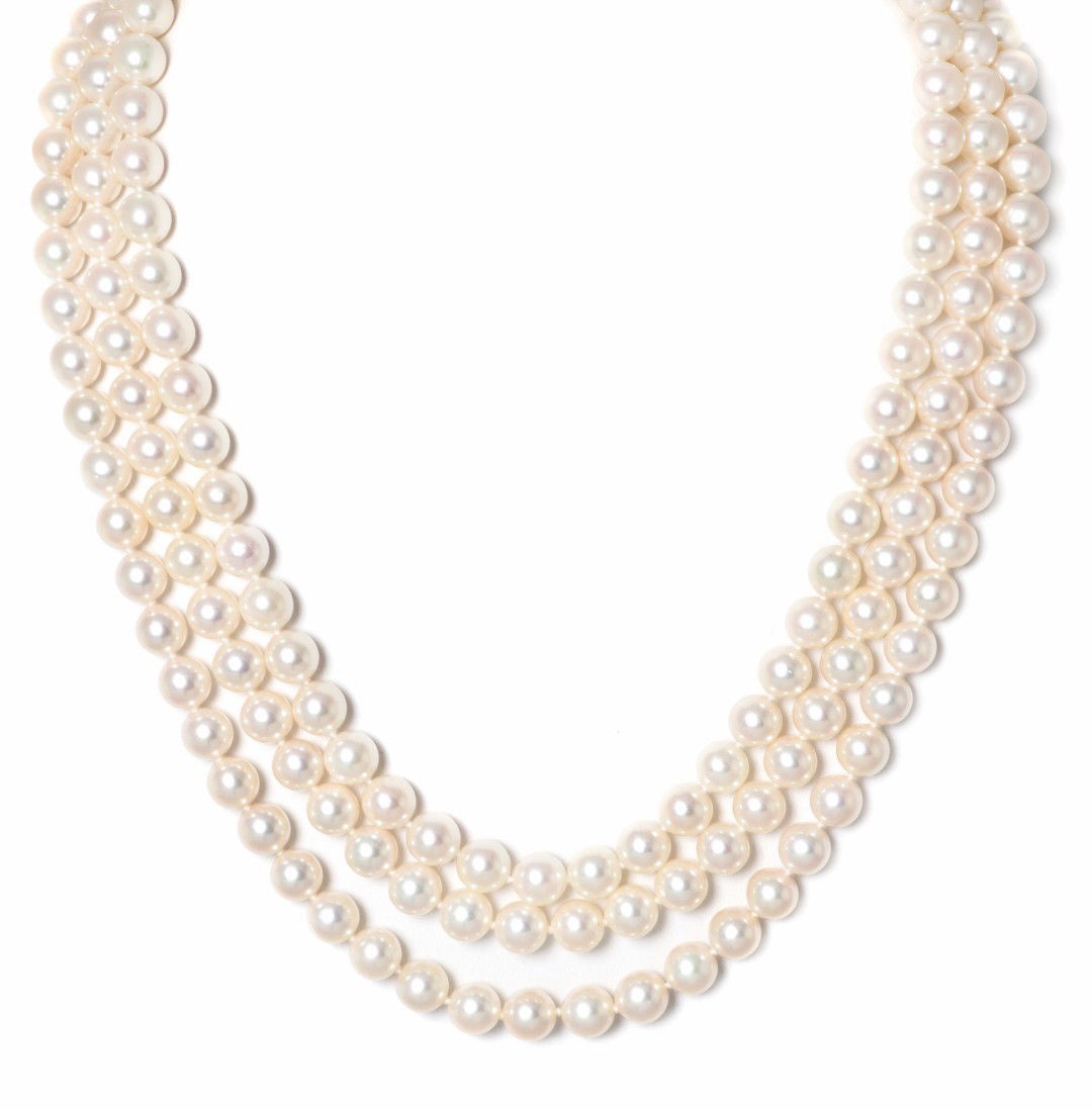 300 A Triple Strand Cultured Pearl Necklace, Mikimoto,