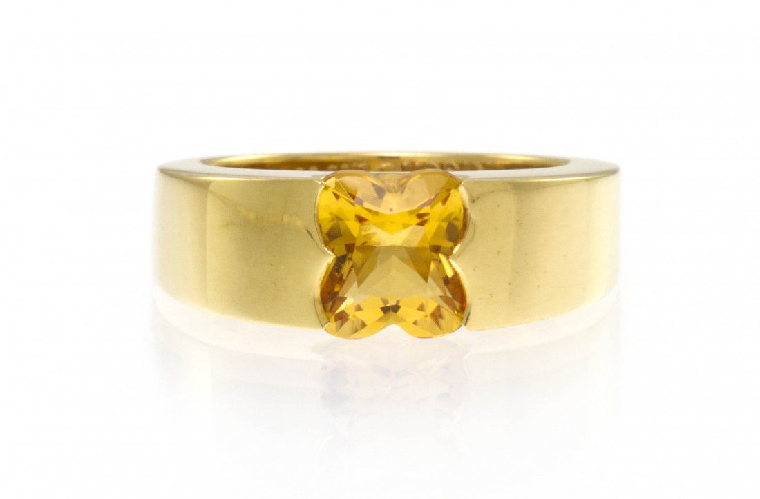 An 18 Karat Yellow Gold and Citrine Ring, Maubouss: An 18 Karat Yellow Gold and Citrine Ring, Mauboussin, containing one lily cut citrine. Stamp: MAUBOUSSIN 750 51 PARIS C0803. 6.60 dwts.