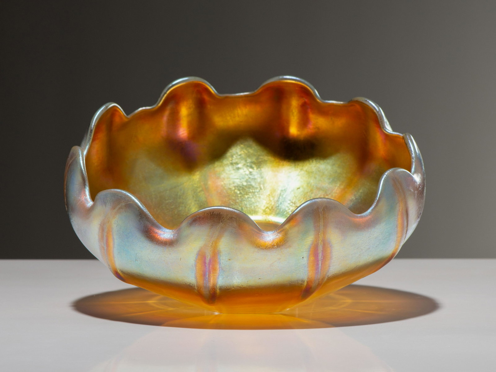 Tiffany Studios American, Early 20th Century Bowl: Tiffany Studios American, Early 20th Century Bowl favrile glass marked L.C.T. Favrile to underside Diameter 6 1/4 inches. This lot is located in Cincinnati.