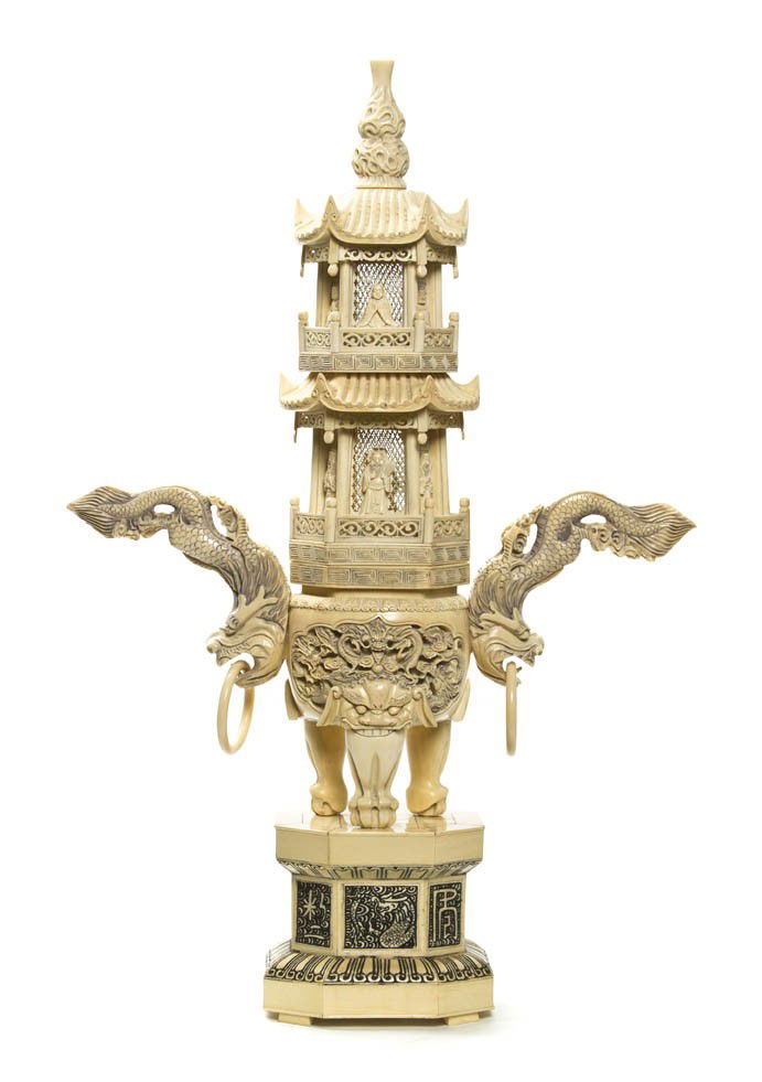 A Chinese Carved Ivory Censer, Height overall 20 1: A Chinese Carved Ivory Censer, having a pagoda form lid with pierced panels of decoration, the body flanked by serpent form handles with free-moving rings, the body raised on three animal claw legs, f