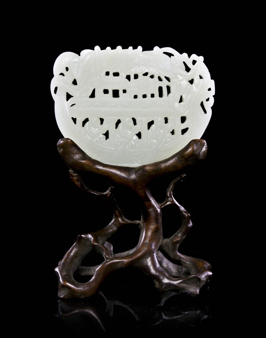 A White Jade Plaque, Width of plaque 3 1/4 inches.: A White Jade Plaque, of even colored stone, having pierced carving of a dragon boat with three oarsman flying pennants and issuing an umbrella, raised on a root form wood stand. Width of plaque 3 1/4 
