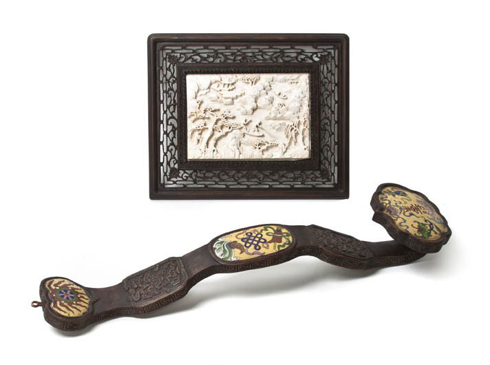 A Chinese Carved Ivory Plaque and Ruyi Scepter, He: A Chinese Carved Ivory Plaque and Ruyi Scepter, of rectangular form depicting figures in a boat within a pierced wood frame, together with a wood ruyi scepter with cloisonne plaques. Height of ivory 4