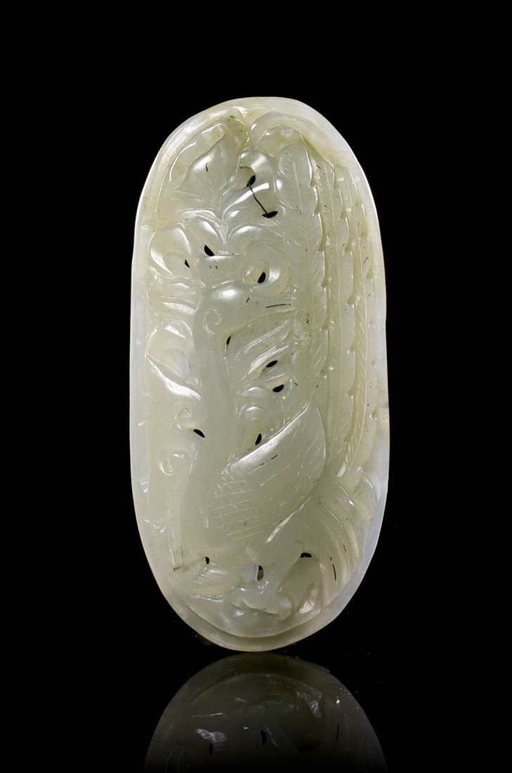 A Pierce Carved Jade Plaque, Height 3 1/2 inches.: A Pierce Carved Jade Plaque, of pale celadon colored stone, likely from the handle of a ruyi scepter, depicting a phoenix surrounded by scrolling foliage. Height 3 1/2 inches. Property from the Zeiser