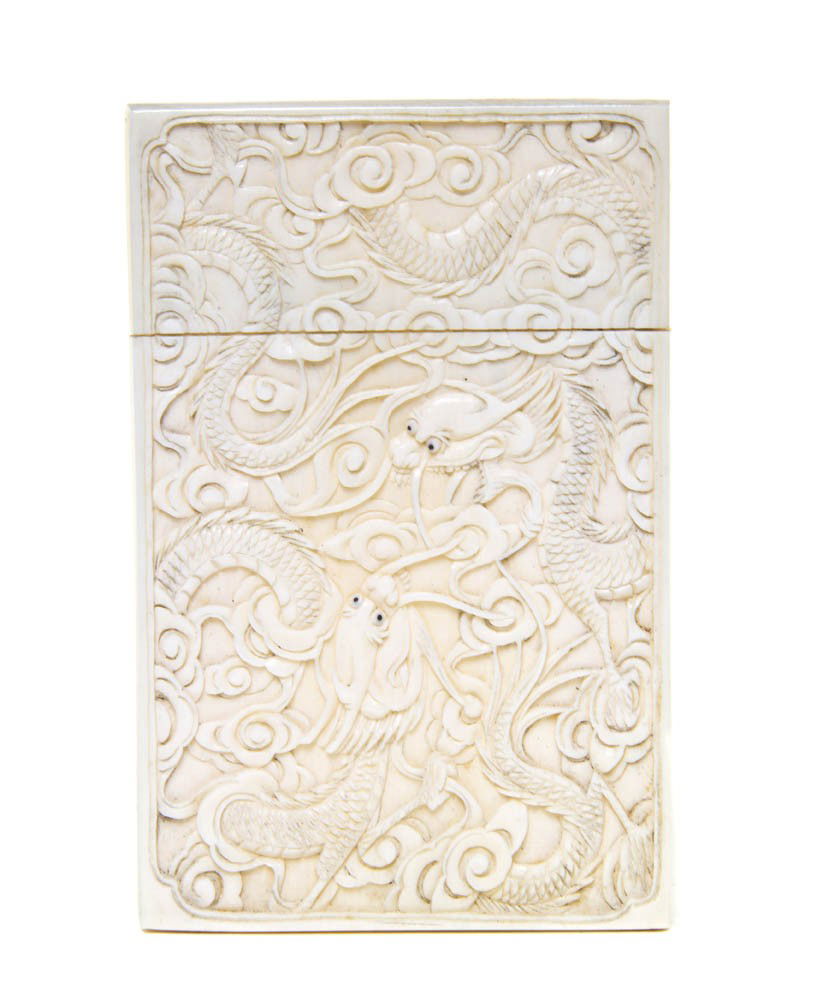 An Ivory Card Case, Height 4 1/8 x width 2 5/8 inc: An Ivory Card Case, of rectangular form and having a separate lid. Height 4 1/8 x width 2 5/8 inches.